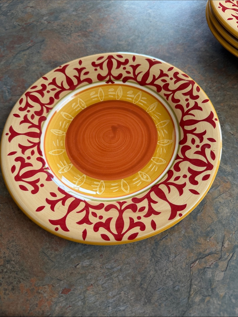 American Simplicity stoneware.  Salad plate in Villa pattern. Orang, red, green